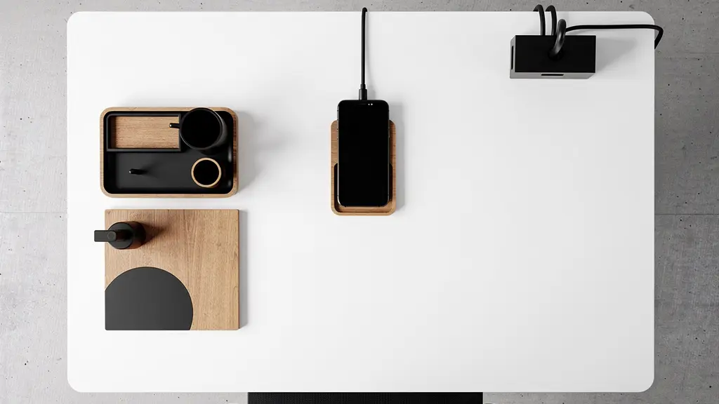 Vue aérienne d'un bureau moderne montrant l'organisation optimale de l'espace avec accessoires bien dimensionnés